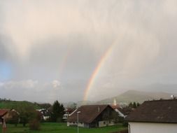 bright rainbow in the countryside