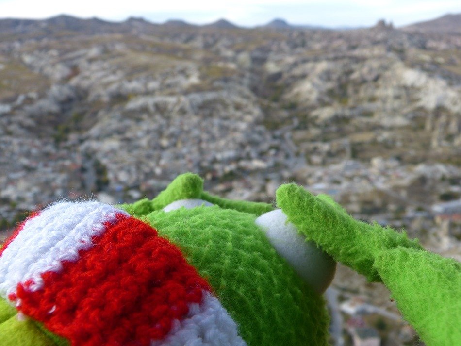 toy frog on background of Tufa