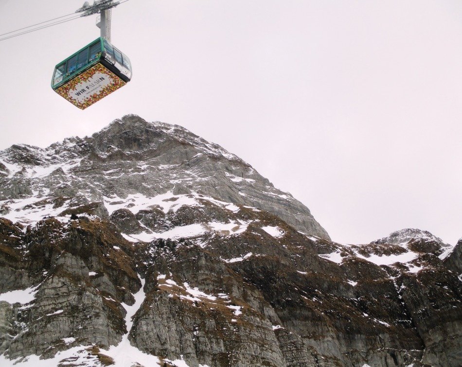 cable car in the background of the mountains