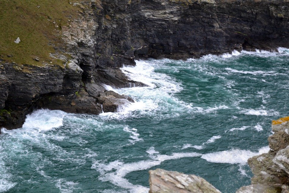 rocky coastline at tintagel castle, uk