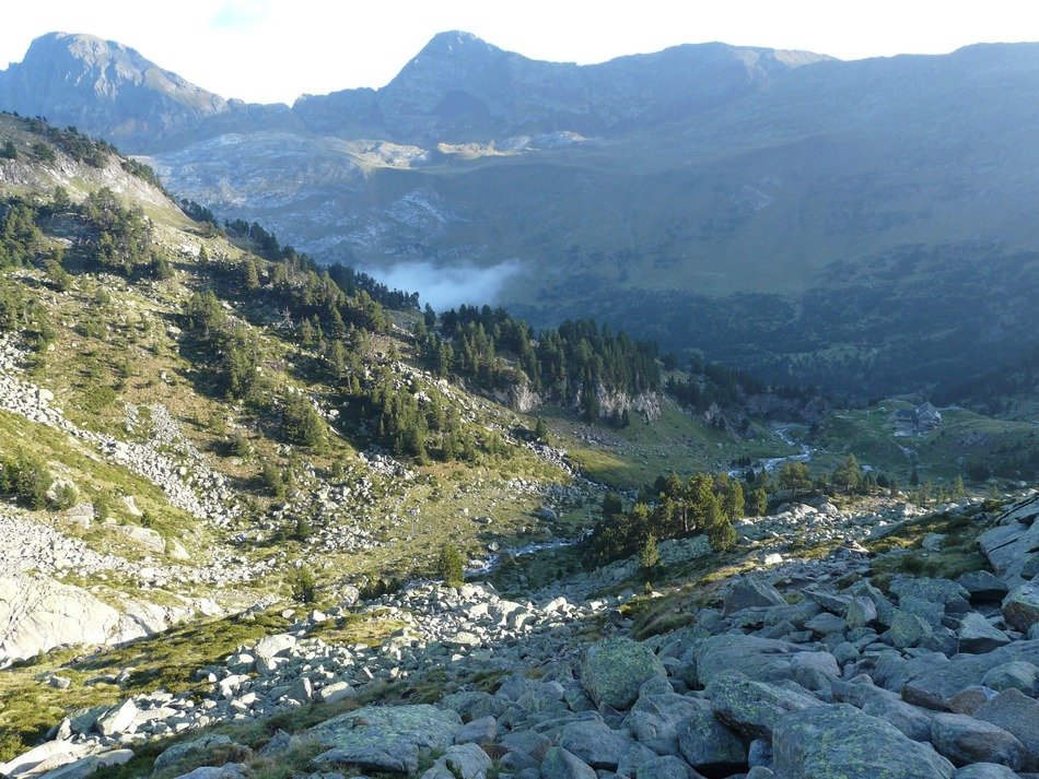 mountain hut in the valley against the backdrop of the Pyrenees