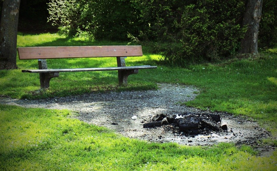 Fireplace near the bench in the forest