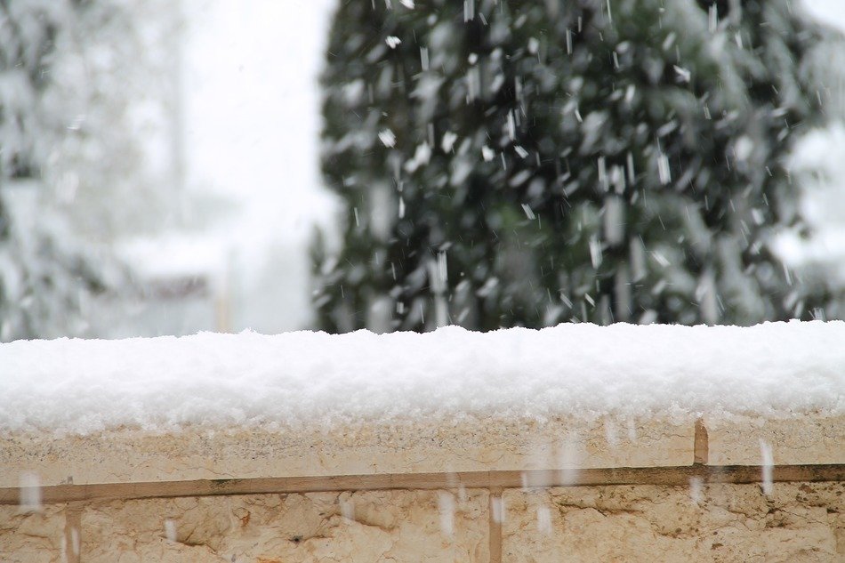 Snow on the wall in winter