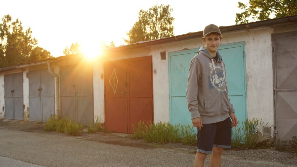 portrait of a boy on a garages background