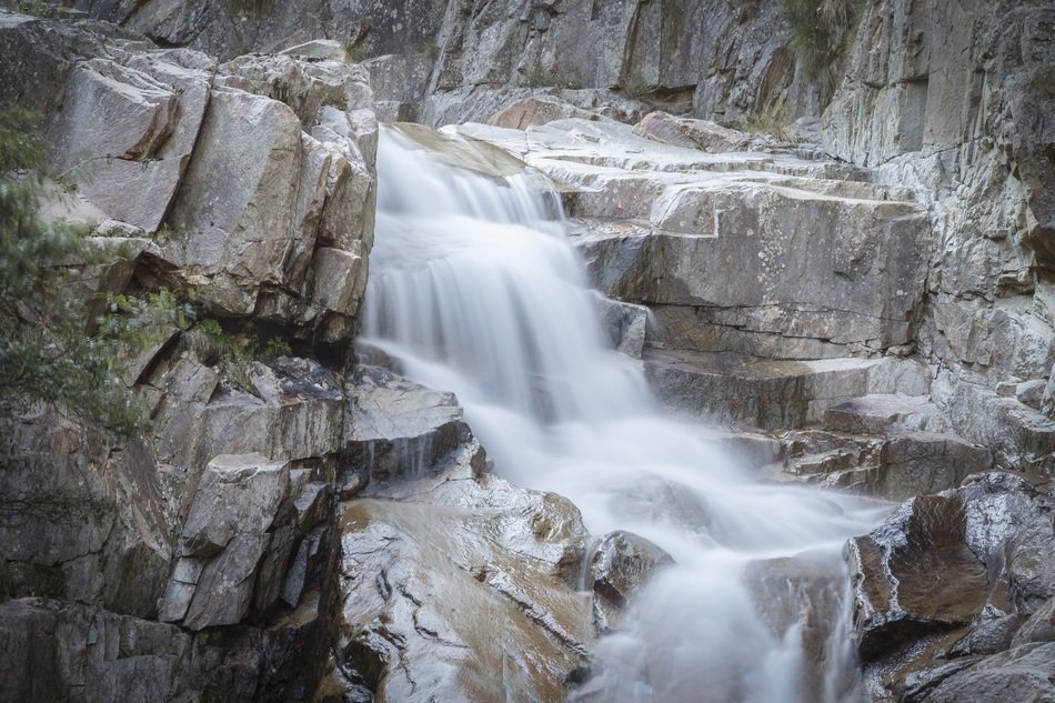 waterfall in mountains of switzerland