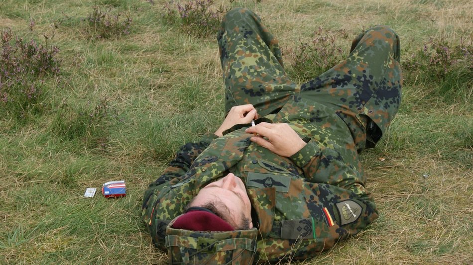 german soldier resting field in the Netherlands