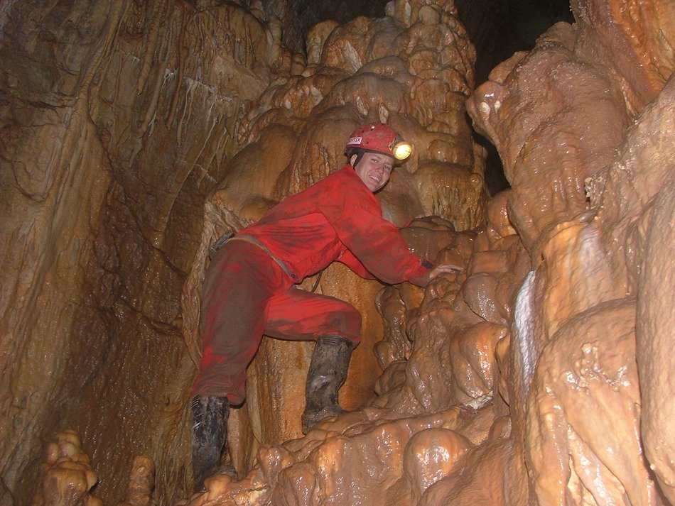 speleologist in a meteorite cave