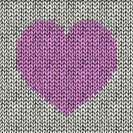 Seamless background with pink knitted heart