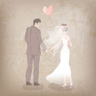 bride and groom with balloon
