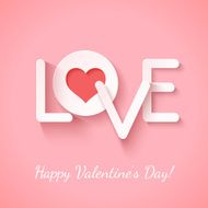 Paper sign love with cotout red heart