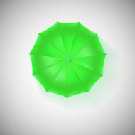 Opened green umbrella top view closeup
