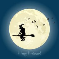 Witch flying on broom stick in Halloween night
