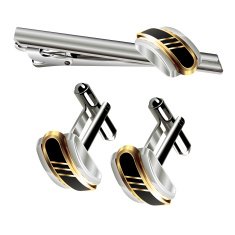 cufflinks and pin on a white background