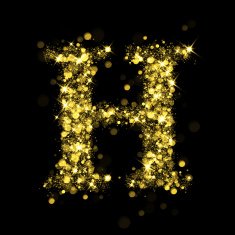 Sparkling letter H of glittering stars bokeh