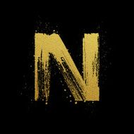 Gold glittering brush hand painted letter N