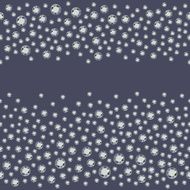 Seamless scattered diamonds (gems rhinestones) isolated on grey