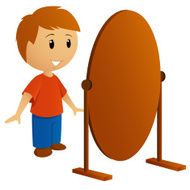 Young man in red shirt looking mirror
