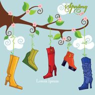 Spring flowering branch and colored high heel boots