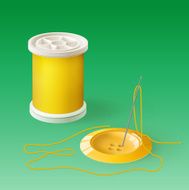 Spool of thread and button with needle