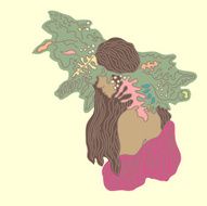 Young girl with long hair in a natural wreath