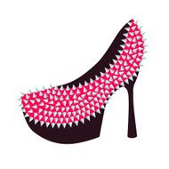 Women&#039;s high-heeled pink shoes decorated with studs