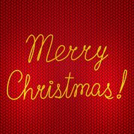 Vector abstract knitted red background with yellow Merry Christmas embroidery
