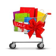 Shopping cart full of bags and a gift bow