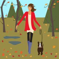 girl and dog walking in autumn park