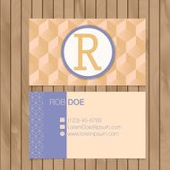 Business card with alphabet letter on a wood background N20
