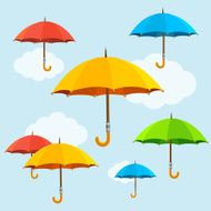 Vector colorful umbrellas fly background Flat design style