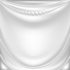 silk drapery and pearl necklace