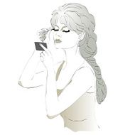 Woman paints eyelashes