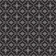 Ethnic ornamental tribal textile seamless pattern