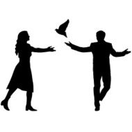 Silhouettes girl and guy released doves