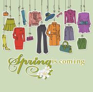 Womans clothing and accessories hanging on ropes Spring