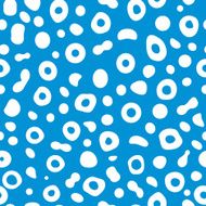 seamless spotted background on blue