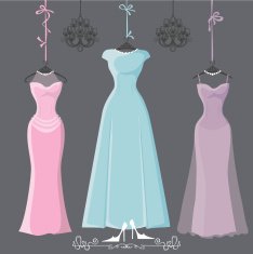Three retro long bridesmaid dresses hang on ribbons