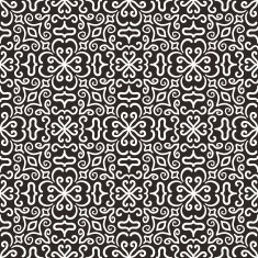 White graphic flower pattern on dark background