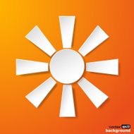 Abstract white paper sun on orange background