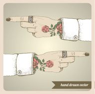 Tattooed hand and with pointing finger