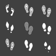 Set of footprints and shoeprints icons showing bare feet N2