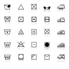 Fabric care sign and symbol icons with reflect on white