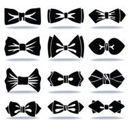 Several black silhouettes of bow tie with shadow