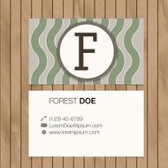 Business card with alphabet letter on a wood background N24