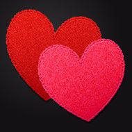 Two bright fabric hearts
