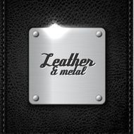 Metal badge on leather background N2