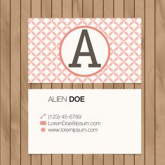 Business card with alphabet letter on a wood background N26