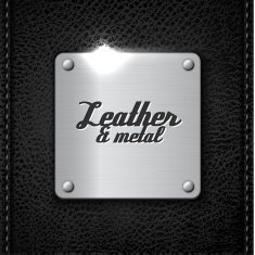 Metal badge on leather background N2