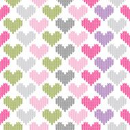 Seamless pattern of colored hearts loops on white isolated