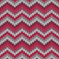Knitted geometric pattern in red and grey